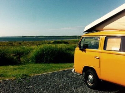 touring campervan on site in the sun