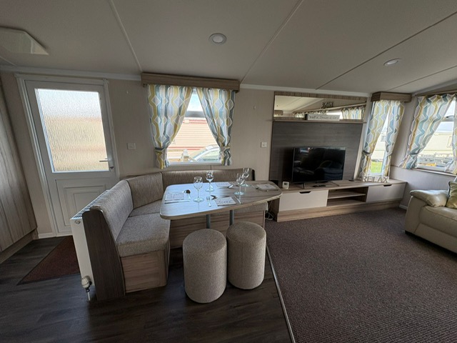 Luxury double bed with pillows in holiday caravan - comfortable sleeping accommodation at Sands of Luce